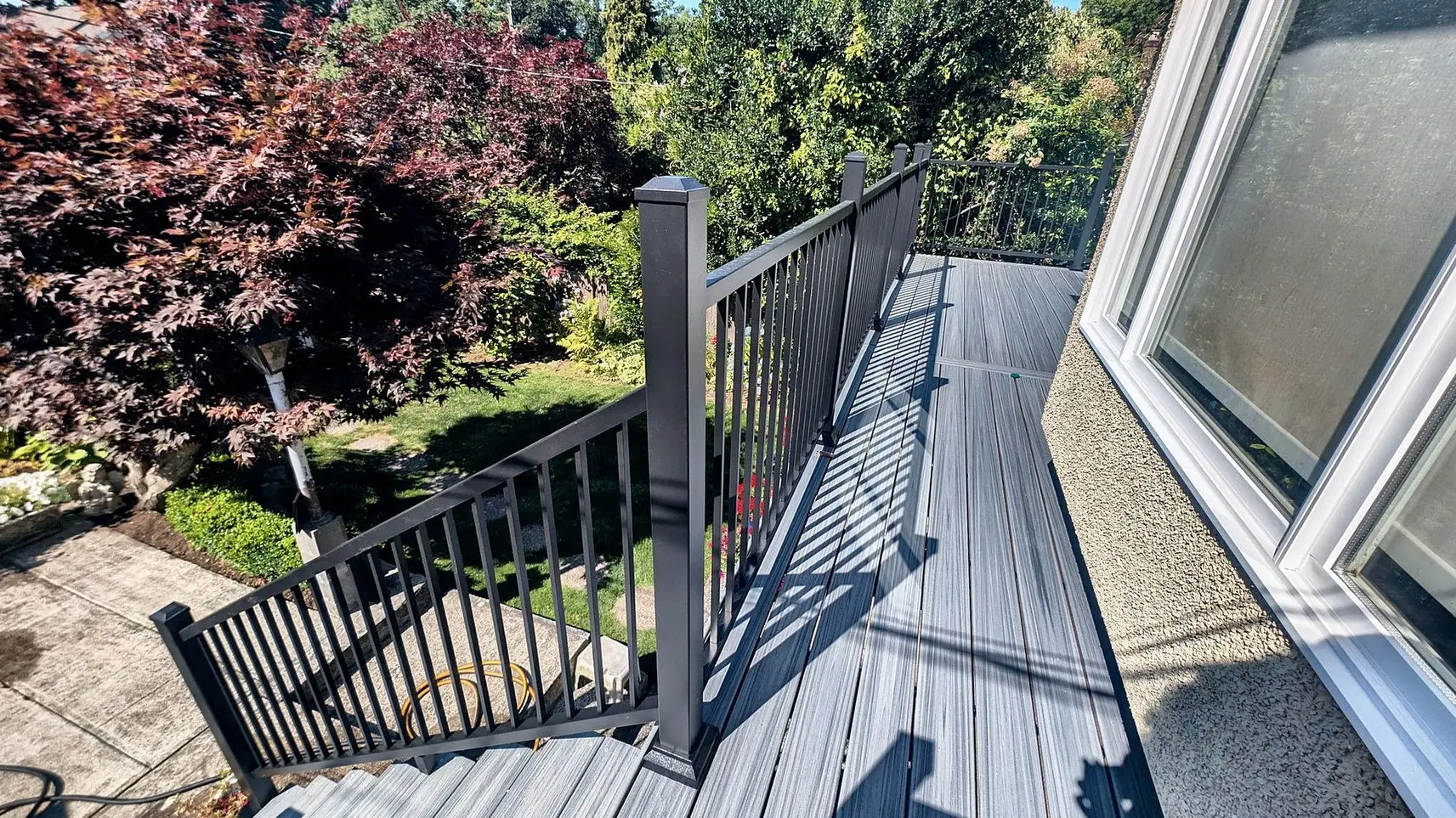 Composite stairs with black aluminum railing, Dunbar