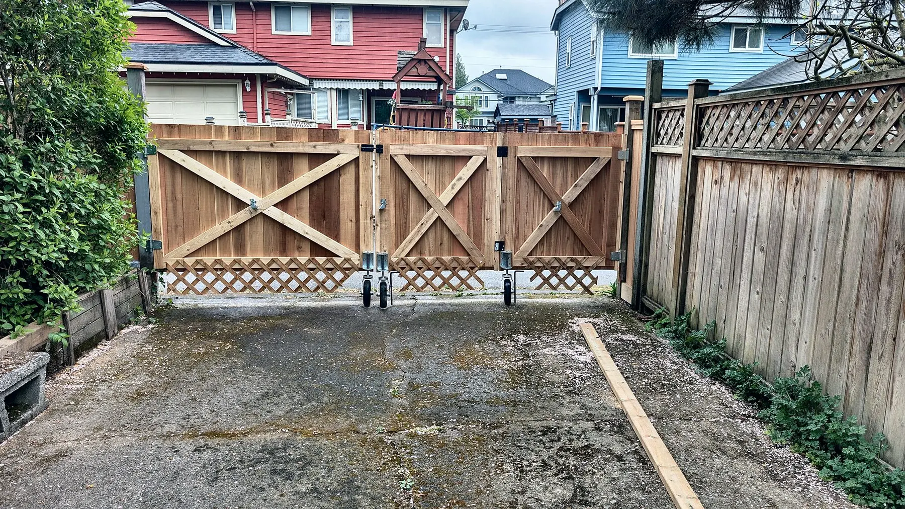Three-panel cedar driveway gate across a 13 ft opening, Surrey