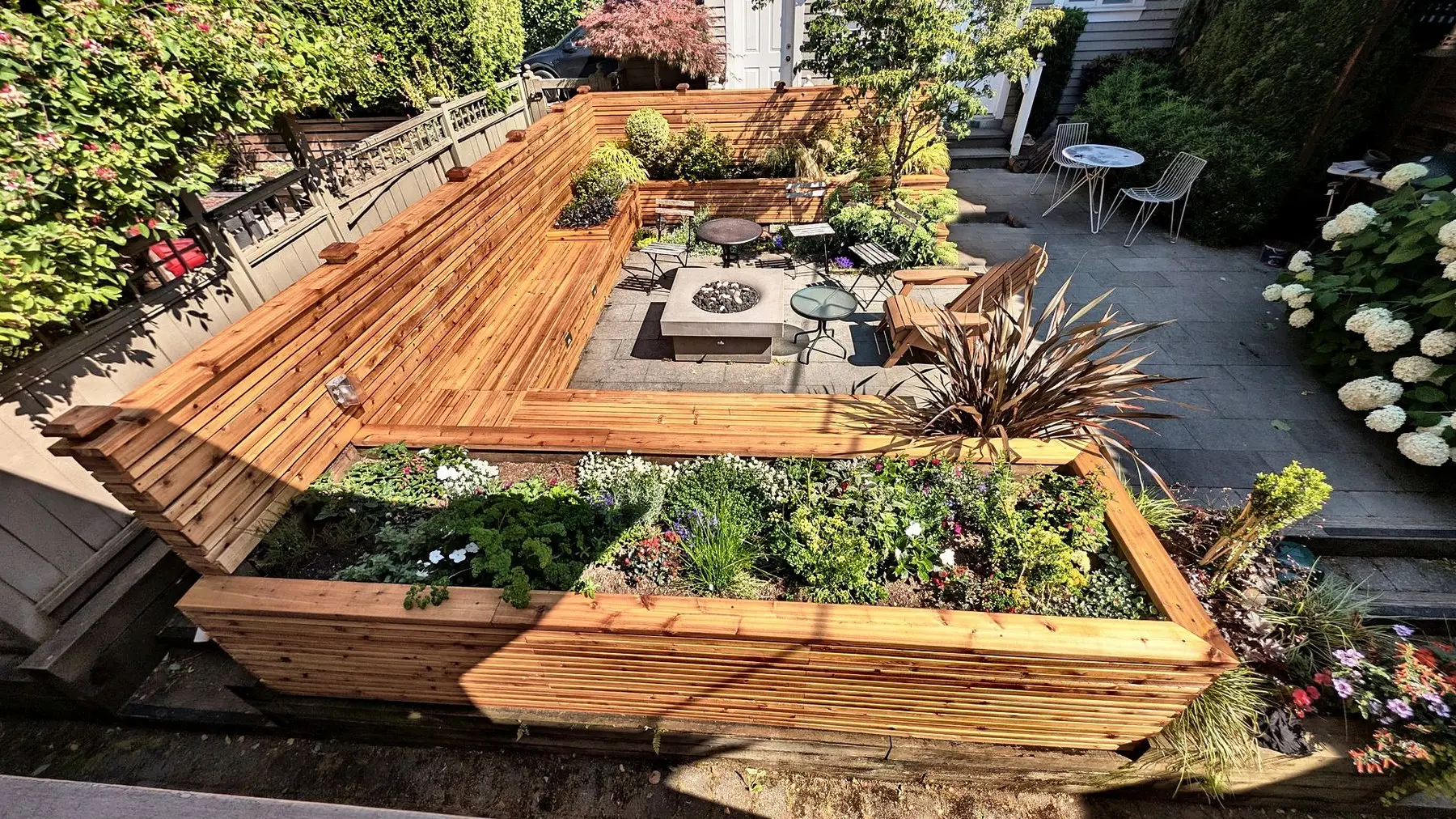 Horizontal cedar fence, planters and seating, Kitsilano, Vancouver