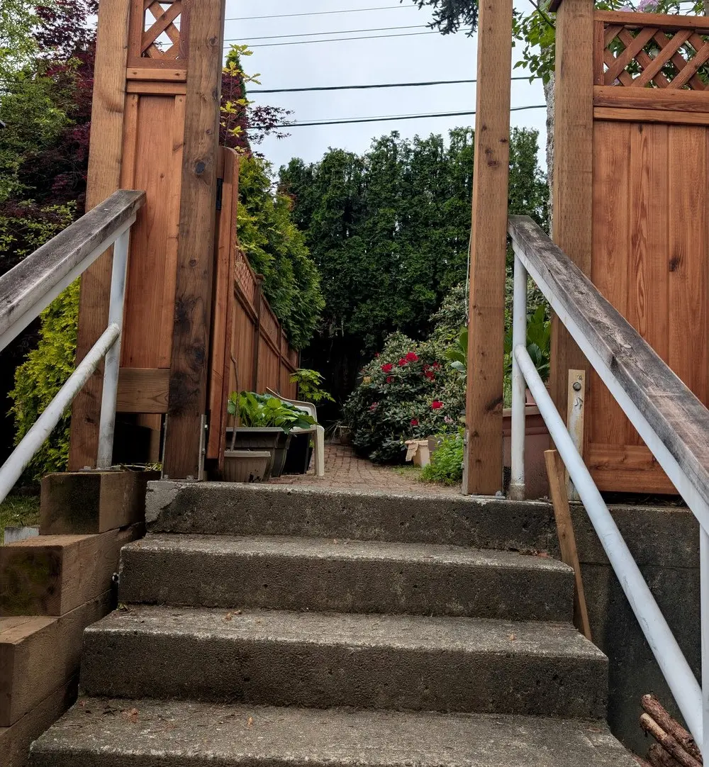 After: Lattice-top fence, entry arbor and arched gate, Coquitlam