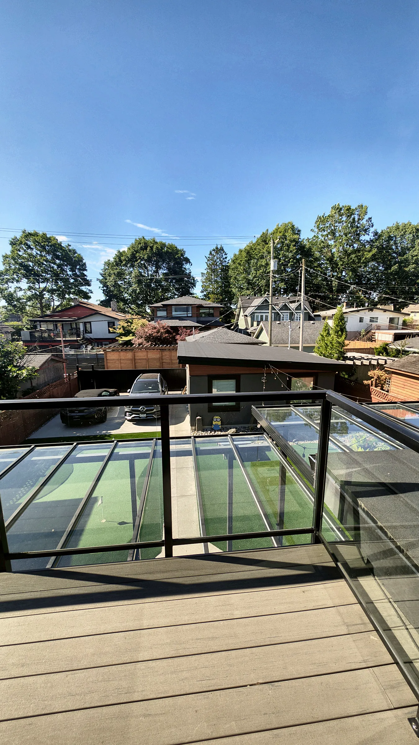 Glass and aluminum railing on a rooftop deck