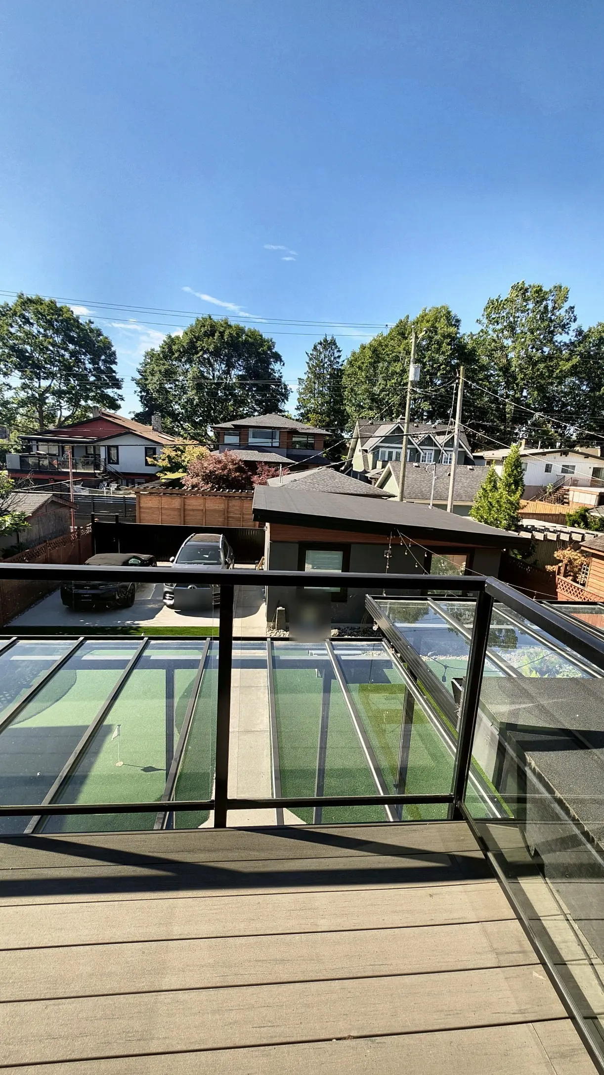 The glass railing from below the deck, Burnaby