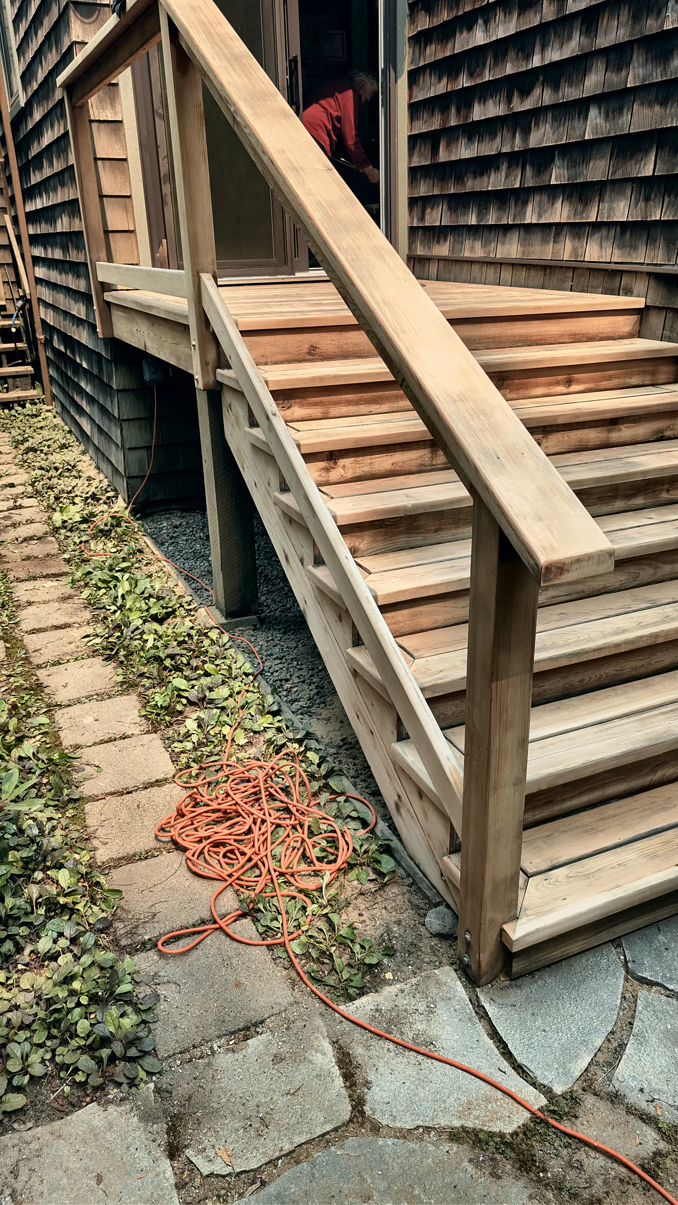 The stairs rebuilt in new cedar, before staining