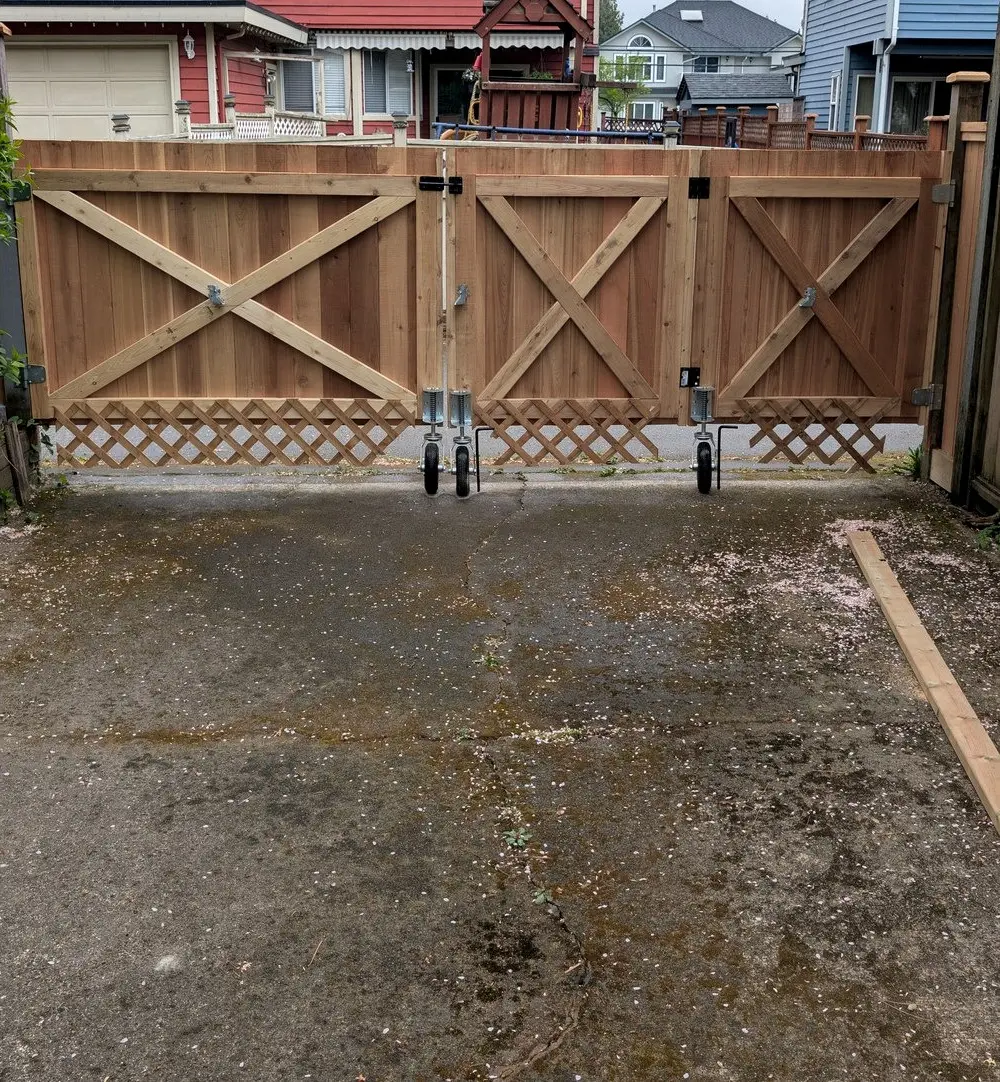 After: Three-panel cedar driveway gate and privacy fence, Surrey